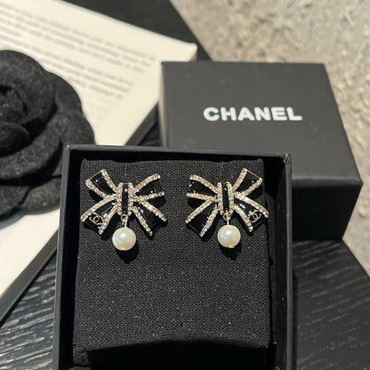 Crystal Bow Pearl Drop Earrings | Black & Silver