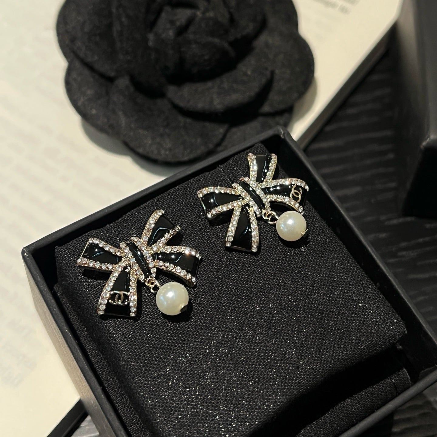 Crystal Bow Pearl Drop Earrings | Black & Silver