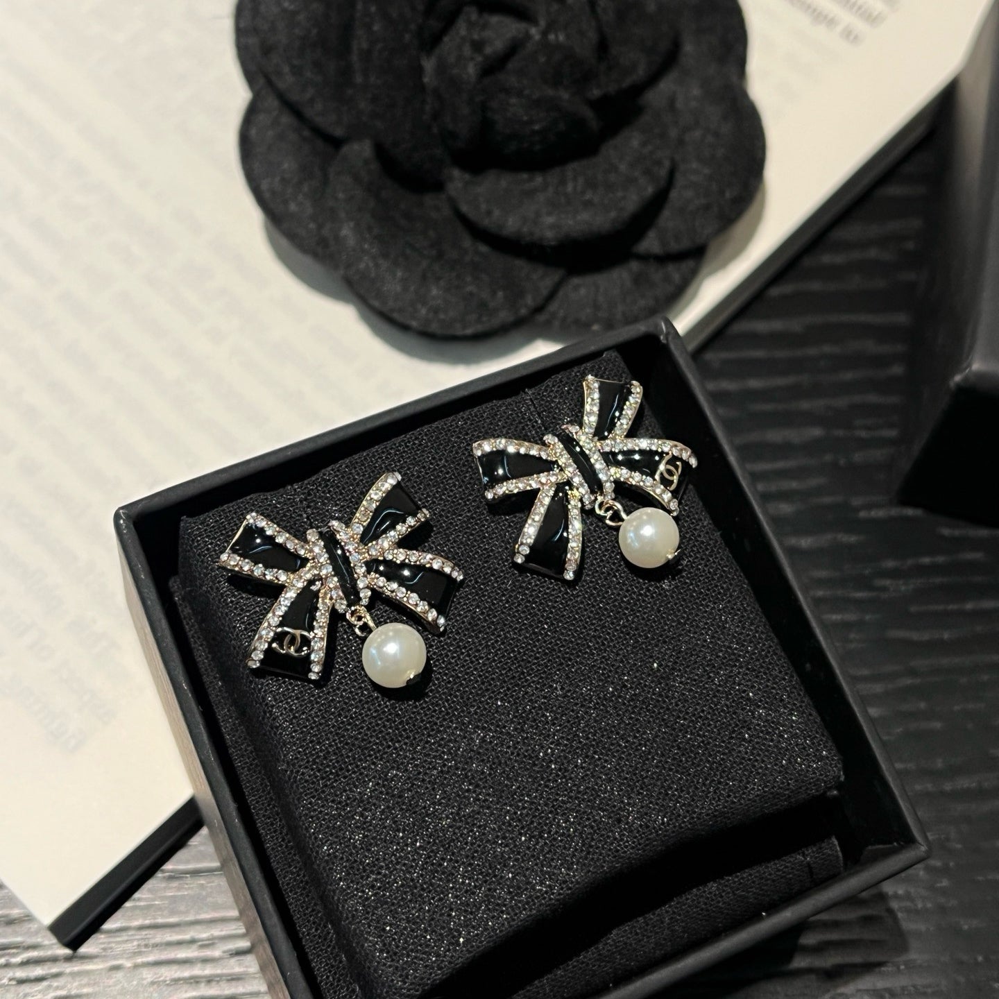 Crystal Bow Pearl Drop Earrings | Black & Silver