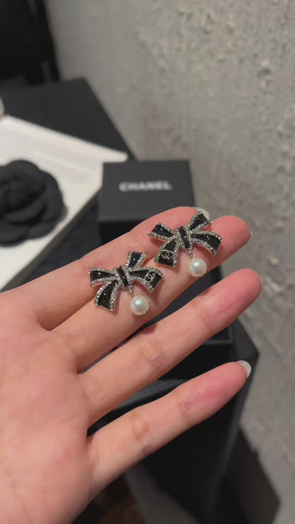 Crystal Bow Pearl Drop Earrings | Black & Silver